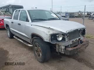 2007 Dodge Dakota SLT with VIN 1D7HW48J67S226053, listed as a IAAI auction lot 42781353 with 241,533 mi miles and . Bid and sale history available at DreamBid. Image 1.