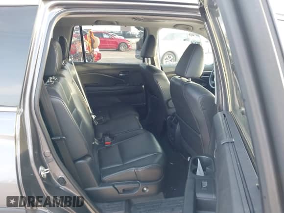 2017 Honda Pilot EX-L with VIN 5FNYF5H86HB020761, listed as a IAAI auction lot 42764250 with 66,033 mi miles and . Bid and sale history available at DreamBid. Image 8.