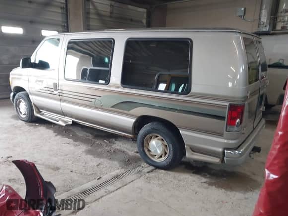 2002 Ford Econoline Cargo Recreational with VIN 1FDRE14L22HB53224, listed as a IAAI auction lot 41967017 with 202,065 mi miles and . Bid and sale history available at DreamBid. Image 3.