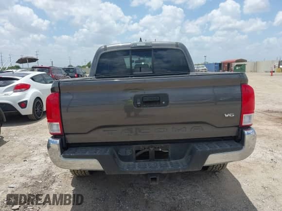 2017 Toyota Tacoma SR5 with VIN 5TFAZ5CN6HX053948, listed as a IAAI auction lot 42843281 with 77,589 mi miles and . Bid and sale history available at DreamBid. Image 15.
