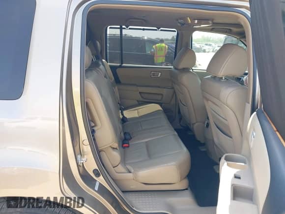 2009 Honda Pilot Touring with VIN 5FNYF38809B004142, listed as a IAAI auction lot 42337103 with 152,874 mi miles and . Bid and sale history available at DreamBid. Image 8.