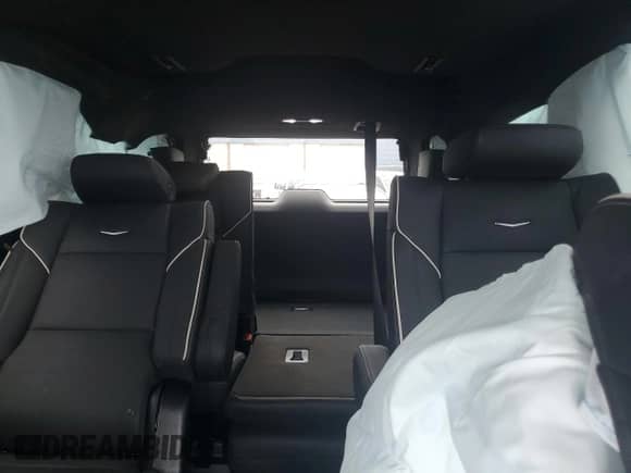 2025 Cadillac Escalade with VIN 1GYS9ERL5SR126002, listed as a Copart auction lot 61239315 with 3,693 mi miles and Salvage title. Bid and sale history available at DreamBid. Image 10.