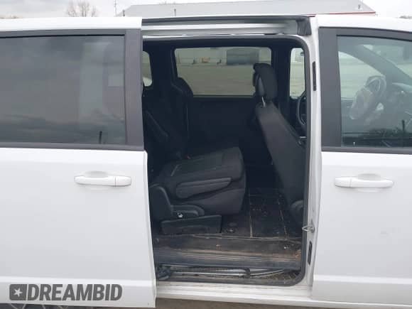 2019 Dodge Grand Caravan SE z VIN 2C4RDGBG6KR619404, wystawiony jako IAAI lot #42077551 z przebiegiem 137 172 mil mil oraz . Historia ofert i sprzedaży dostępna na DreamBid. Obrazek 8.