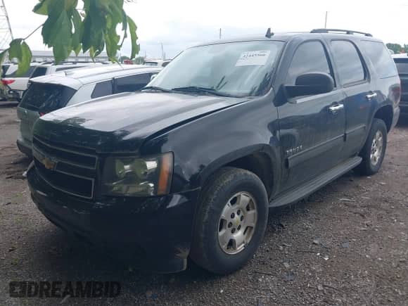 2010 Chevrolet Tahoe LS with VIN 1GNMCAE36AR176492, listed as a IAAI auction lot 42445566 with 203,265 mi miles and . Bid and sale history available at DreamBid. Image 2.