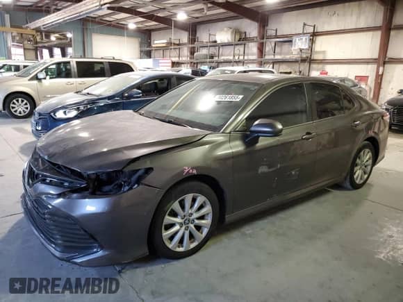 2019 Toyota Camry SE z VIN 4T1B11HKXKU712993, wystawiony jako Copart lot #80261855 z przebiegiem 88 636 mil mil oraz Szkoda całkowita • Salvage title. Historia ofert i sprzedaży dostępna na DreamBid. Obrazek 1.