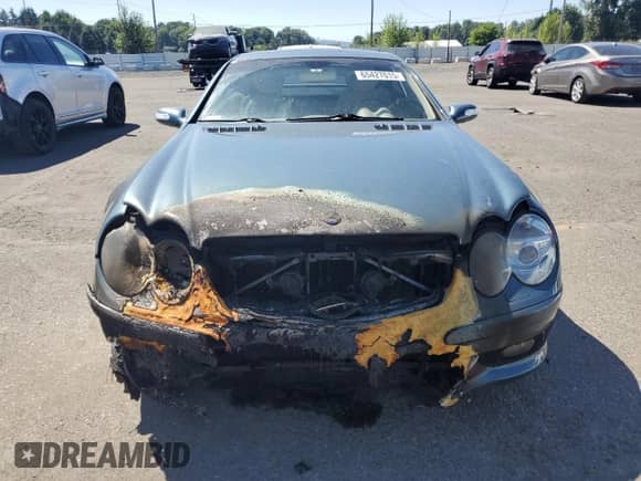 2004 Mercedes-Benz SL 500 z VIN WDBSK75F34F085216, wystawiony jako Copart lot #65427015 z przebiegiem Nie podano mil oraz Szkoda całkowita • Salvage title. Historia ofert i sprzedaży dostępna na DreamBid. Obrazek 5.