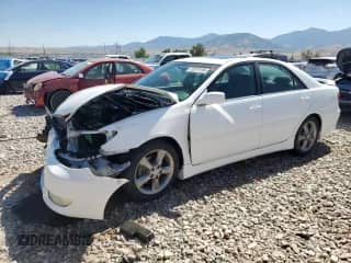 2006 Toyota Camry SE with VIN 4T1BA30K86U093145, listed as a Copart auction lot 63519195 with 112,456 mi miles and Salvage title. Bid and sale history available at DreamBid. Image 1.