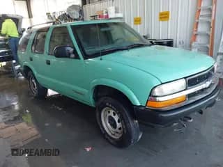 2003 Chevrolet Blazer LS with VIN 1GNDT13XX3K167585, listed as a IAAI auction lot 43350748 with 157,980 mi miles and . Bid and sale history available at DreamBid. Image 1.
