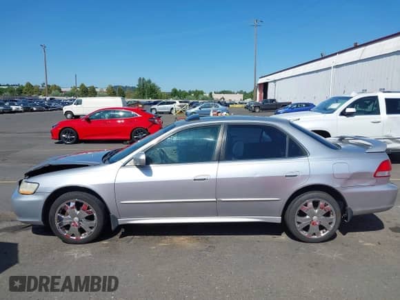 2001 Honda Accord EX with VIN JHMCG56611C020872, listed as a IAAI auction lot 42518660 with 254,397 mi miles and . Bid and sale history available at DreamBid. Image 14.