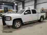 2013 Chevrolet Silverado 1500 LTZ с VIN 3GCPKTE24DG204077, выставлен на аукционе Copart как лот 87686625 с пробегом 214 161 миль миль и Списание • Salvage title. История ставок и продаж доступна на DreamBid. Изображение 1.