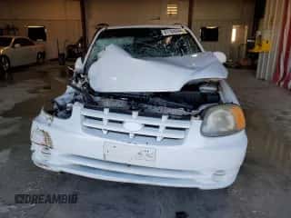 2005 Hyundai Accent GLS с VIN KMHCG35C55U346571, выставлен на аукционе Copart как лот 81104844 с пробегом Не указан миль и Списание • Salvage title. История ставок и продаж доступна на DreamBid. Изображение 5.