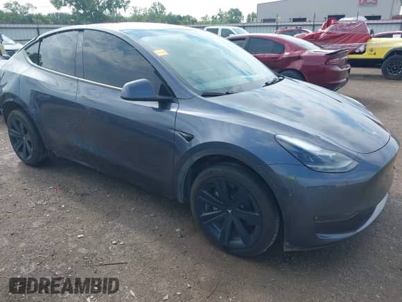 2023 Tesla Model Y Long Range with VIN 7SAYGDEE4PA202135, listed as a IAAI auction lot 42975478 with 27,065 mi miles and . Bid and sale history available at DreamBid. Image 1.