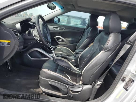 2013 Hyundai Veloster Turbo с VIN KMHTC6AE7DU173199, выставлен на аукционе Copart как лот 81507235 с пробегом 134 071 миль миль и Списание • Salvage title. История ставок и продаж доступна на DreamBid. Изображение 7.