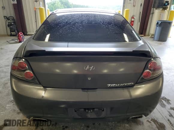 2007 Hyundai Tiburon GS с VIN KMHHM66D57U261613, выставлен на аукционе Copart как лот 57821245 с пробегом 185 489 миль миль и Списание • Salvage title. История ставок и продаж доступна на DreamBid. Изображение 6.