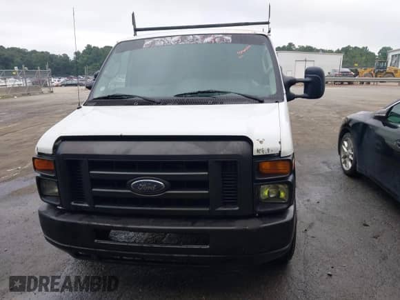 2012 Ford Econoline Cargo Commercial with VIN 1FTNE1EW0CDA98132, listed as a IAAI auction lot 42900339 with 264,472 mi miles and . Bid and sale history available at DreamBid. Image 12.