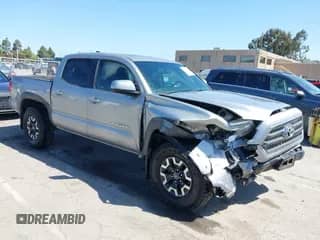 2016 Toyota Tacoma SR5 z VIN 3TMAZ5CNXGM019256, wystawiony jako IAAI lot #42294477 z przebiegiem 123 680 mil mil oraz . Historia ofert i sprzedaży dostępna na DreamBid. Obrazek 1.