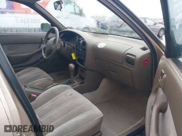 1996 Toyota Camry DX с VIN 4T1BG12KXTU812035, выставлен на аукционе IAAI как лот 43016617 с пробегом 149 044 миль миль и . История ставок и продаж доступна на DreamBid. Изображение 5.