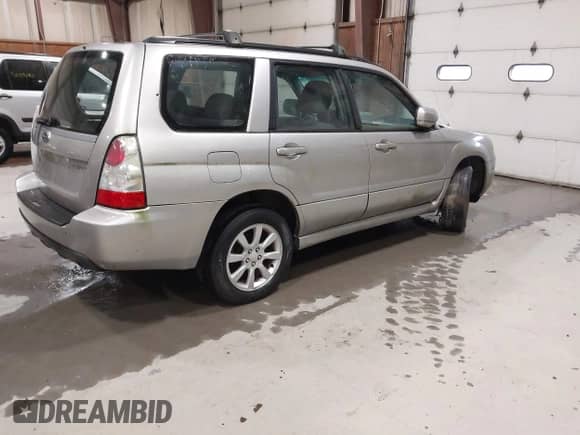 2006 Subaru Forester X with VIN JF1SG65646H726741, listed as a IAAI auction lot 43423864 with 231,019 mi miles and . Bid and sale history available at DreamBid. Image 4.