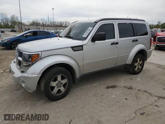 2008 Dodge Nitro SXT с VIN 1D8GU28K68W104944, выставлен на аукционе Copart как лот 51437924 с пробегом Не указан миль и На запчасти • Non repairable. История ставок и продаж доступна на DreamBid. Изображение 1.