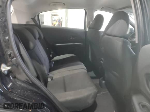 2019 Honda HR-V LX z VIN 3CZRU6H32KG702195, wystawiony jako Copart lot #82227745 z przebiegiem 143 051 mil mil oraz Szkoda całkowita • Salvage title. Historia ofert i sprzedaży dostępna na DreamBid. Obrazek 11.