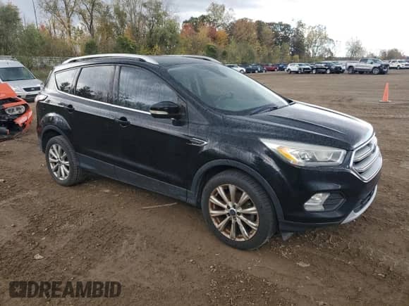 2017 Ford Escape Titanium с VIN 1FMCU0JD9HUE22755, выставлен на аукционе Copart как лот 87491745 с пробегом 158 322 миль миль и Чистый • Clean title. История ставок и продаж доступна на DreamBid. Изображение 4.
