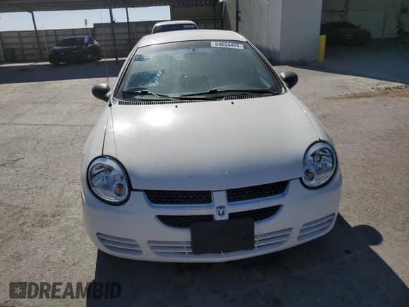 2005 Dodge Neon SXT with VIN 1B3ES56C05D171072, listed as a Copart auction lot 61170435 with 218,495 mi miles and Salvage title. Bid and sale history available at DreamBid. Image 5.