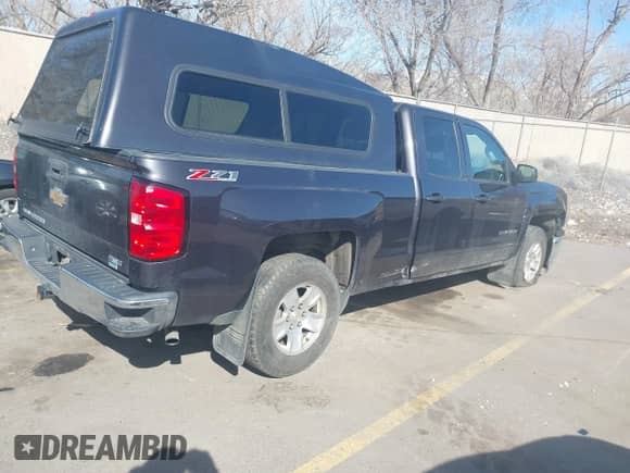 2015 Chevrolet Silverado 1500 LT with VIN 1GCVKREC2FZ406714, listed as a IAAI auction lot 41750306 with Not provided miles and . Bid and sale history available at DreamBid. Image 4.