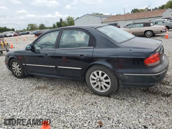 2002 Hyundai Sonata GLS with VIN KMHWF35H52A615774, listed as a Copart auction lot 72336474 with 156,588 mi miles and Salvage title. Bid and sale history available at DreamBid. Image 2.