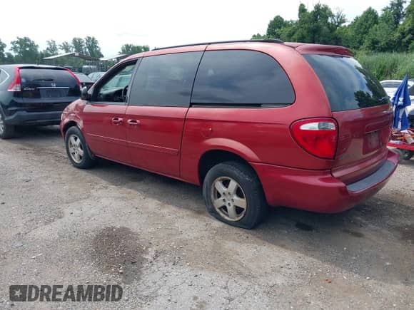 2007 Dodge Grand Caravan SXT with VIN 2D4GP44L17R332540, listed as a IAAI auction lot 42777356 with 93,772 mi miles and . Bid and sale history available at DreamBid. Image 3.