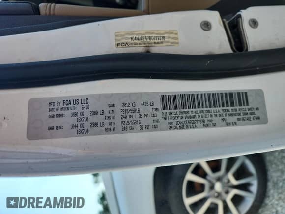 2016 Jeep Compass Latitude with VIN 1C4NJCEA7GD777378, listed as a Copart auction lot 56390385 with 123,186 mi miles and Salvage title. Bid and sale history available at DreamBid. Image 13.