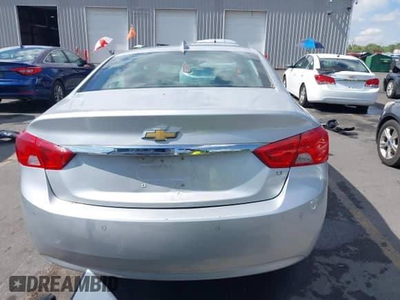 2016 Chevrolet Impala LT z VIN 2G1105SA8G9138532, wystawiony jako IAAI lot #43269051 z przebiegiem 141 773 mil mil oraz . Historia ofert i sprzedaży dostępna na DreamBid. Obrazek 16.