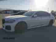 2022 BMW 7 Series 740i z VIN WBA7T2C06NCK72777, wystawiony jako Copart lot #72420104 z przebiegiem 33 762 mil mil oraz Szkoda całkowita • Salvage title. Historia ofert i sprzedaży dostępna na DreamBid. Obrazek 1.
