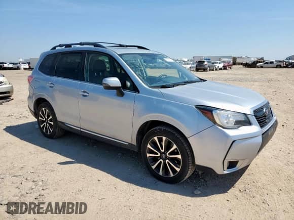 2017 Subaru Forester Touring z VIN JF2SJGWC6HH498784, wystawiony jako Copart lot #71694785 z przebiegiem 65 980 mil mil oraz Czysty tytuł • Clean title. Historia ofert i sprzedaży dostępna na DreamBid. Obrazek 4.