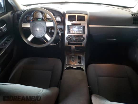 2010 Dodge Charger SXT with VIN 2B3CA3CV0AH290595, listed as a Copart auction lot 73893904 with 127,733 mi miles and Salvage title. Bid and sale history available at DreamBid. Image 8.