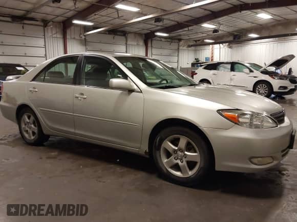 2002 Toyota Camry LE z VIN 4T1BE32K02U033310, wystawiony jako IAAI lot #42586585 z przebiegiem 154 658 mil mil oraz . Historia ofert i sprzedaży dostępna na DreamBid. Obrazek 14.