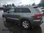 2012 Jeep Grand Cherokee Limited z VIN 1C4RJFBG2CC187150, wystawiony jako Copart lot #84956805 z przebiegiem 136 040 mil mil oraz Szkoda całkowita • Salvage title. Historia ofert i sprzedaży dostępna na DreamBid. Obrazek 2.