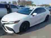 2021 Toyota Camry XSE with VIN 4T1K61AK4MU438222, listed as a IAAI auction lot 43237160 with 49,103 mi miles and . Bid and sale history available at DreamBid. Image 2.