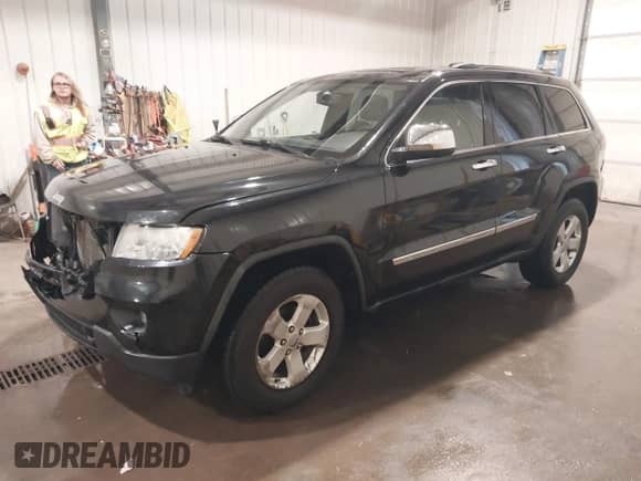 2011 Jeep Grand Cherokee 70th Anniversary с VIN 1J4RR4GG3BC680723, выставлен на аукционе IAAI как лот 41748828 с пробегом 166 480 миль миль и . История ставок и продаж доступна на DreamBid. Изображение 2.