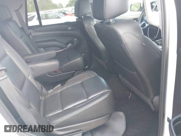 2018 Chevrolet Tahoe LT z VIN 1GNSCBKC9JR360617, wystawiony jako IAAI lot #42134543 z przebiegiem 81 040 mil mil oraz . Historia ofert i sprzedaży dostępna na DreamBid. Obrazek 8.