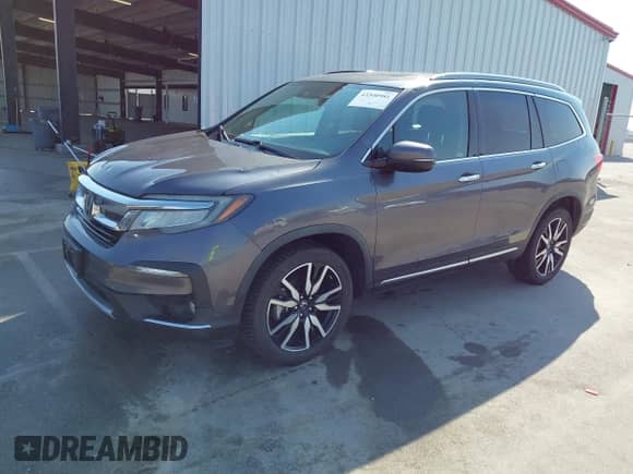 2019 Honda Pilot Touring 7-Passenger z VIN 5FNYF6H64KB003422, wystawiony jako IAAI lot #43340981 z przebiegiem 86 350 mil mil oraz . Historia ofert i sprzedaży dostępna na DreamBid. Obrazek 2.