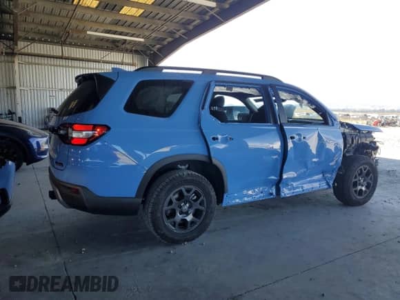 2024 Honda Pilot TrailSport with VIN 5FNYG1H62RB048577, listed as a Copart auction lot 67639245 with 9,430 mi miles and Salvage title. Bid and sale history available at DreamBid. Image 3.