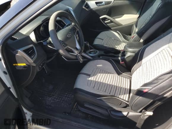 2013 Hyundai Veloster w/Gray Int z VIN KMHTC6AD4DU104557, wystawiony jako Copart lot #86129525 z przebiegiem 109 991 mil mil oraz Szkoda całkowita • Salvage title. Historia ofert i sprzedaży dostępna na DreamBid. Obrazek 7.