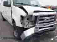 2013 Ford Econoline Cargo Commercial with VIN 1FTNE1EW1DDA21867, listed as a IAAI auction lot 41280581 with 186,166 mi miles and . Bid and sale history available at DreamBid. Image 6.