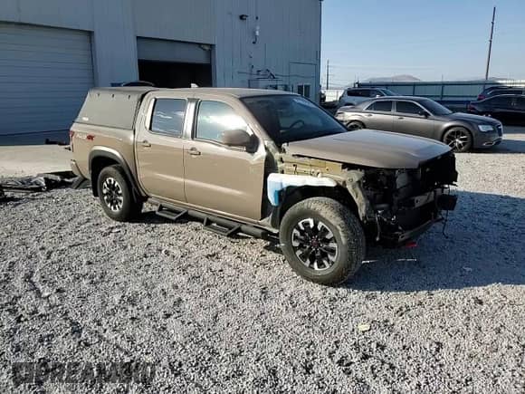 2024 Nissan Frontier Pro-4X with VIN 1N6ED1EK4RN622270, listed as a Copart auction lot 81142545 with 6,749 mi miles and Salvage title. Bid and sale history available at DreamBid. Image 14.