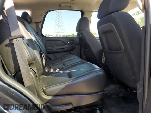 2010 Chevrolet Tahoe LS with VIN 1GNMCAE09AR256410, listed as a Copart auction lot 71730955 with 234,851 mi miles and Salvage title. Bid and sale history available at DreamBid. Image 11.