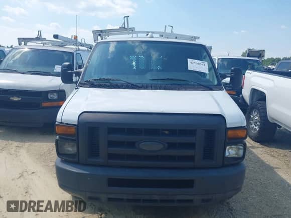 2014 Ford Econoline Cargo Commercial with VIN 1FTNE1EW4EDB15338, listed as a IAAI auction lot 42530382 with 185,886 mi miles and . Bid and sale history available at DreamBid. Image 6.