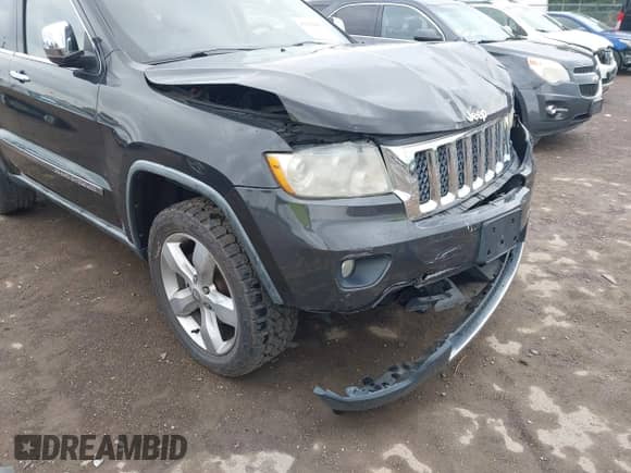2011 Jeep Grand Cherokee Overland z VIN 1J4RR6GG5BC737094, wystawiony jako IAAI lot #43115697 z przebiegiem 184 207 mil mil oraz . Historia ofert i sprzedaży dostępna na DreamBid. Obrazek 17.