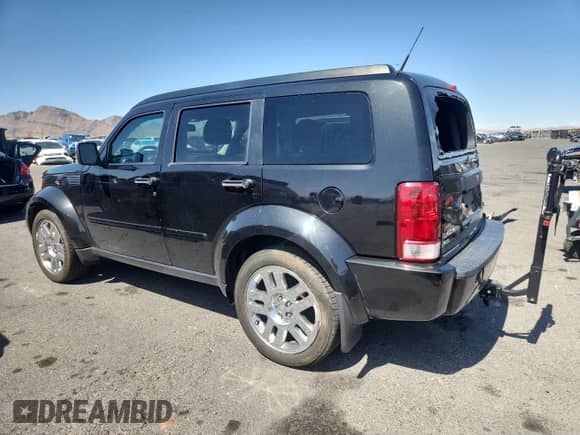 2011 Dodge Nitro Heat with VIN 1D4PT4GX6BW506192, listed as a Copart auction lot 58795955 with 231,377 mi miles and Salvage title. Bid and sale history available at DreamBid. Image 2.