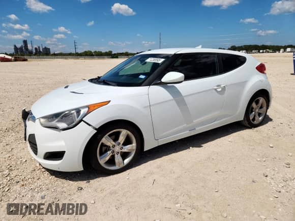 2014 Hyundai Veloster z VIN KMHTC6ADXEU211730, wystawiony jako Copart lot #71236595 z przebiegiem 107 121 mil mil oraz Szkoda całkowita • Salvage title. Historia ofert i sprzedaży dostępna na DreamBid. Obrazek 1.