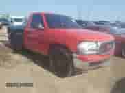 1999 GMC Sierra 1500 SL with VIN 1GTEC14W4XZ535548, listed as a Copart auction lot 64038555 with 142,483 mi miles and Salvage title. Bid and sale history available at DreamBid. Image 4.